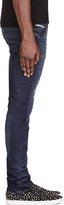 Thumbnail for your product : Diesel Blue Ripped Thavar Jeans