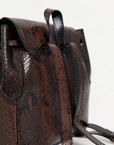 Thumbnail for your product : ASOS DESIGN mini soft minimal backpack in snake