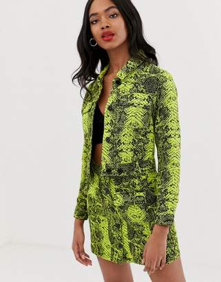 ASOS Design DESIGN denim jacket in neon lime snake print