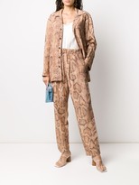 Thumbnail for your product : Mara Hoffman Snake-Skin Print Trousers