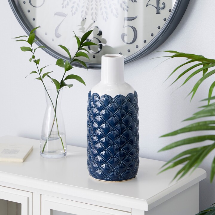 Litton Lane Blue Ceramic Floral Decorative Vase with Cut Out