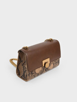 Thumbnail for your product : Charles & Keith Snake Print Chain Strap Clutch
