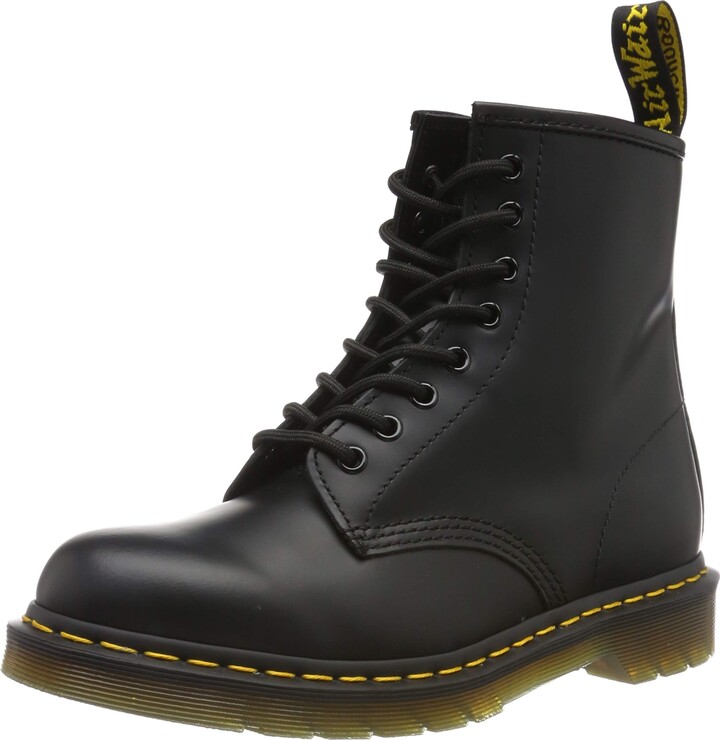 black boots white stitching