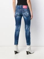 Thumbnail for your product : DSQUARED2 Icon paint-splattered slim-fit jeans