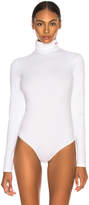 Thumbnail for your product : Calvin Klein Turtleneck Bodysuit in Optic White | FWRD
