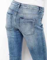 Thumbnail for your product : ASOS Whitby Low Rise Skinny Jeans in Randolph Mid Wash Blue With Ripped Knee