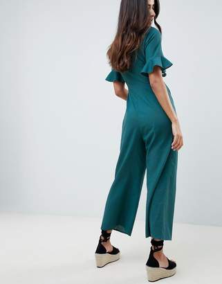 ASOS DESIGN tea jumpsuit with cut out and tie detail in linen