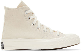 beige converse high tops