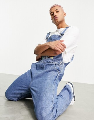 ASOS DESIGN ASOS Actual baggy denim overalls in mid wash blue - ShopStyle  Loose Jeans