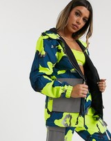 Thumbnail for your product : Nicce oversized jacket with reflective pockets in bright camo co-ord