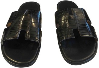 black crocodile sandals