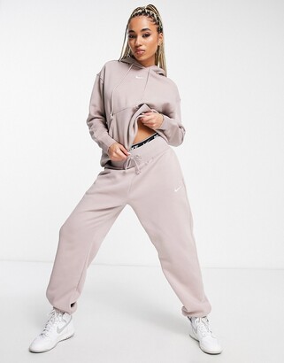 Nike oversized sweatpants in brown - ShopStyle Activewear Trousers