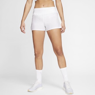 white athletic shorts nike