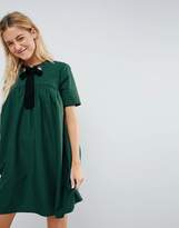 Thumbnail for your product : ASOS DESIGN Mini Smock Dress with Eyelet Detail and Grosgrain Tie