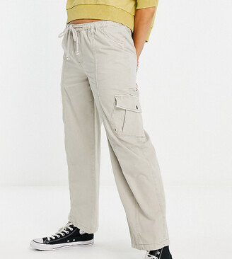 Reclaimed Vintage inspired 00's low rise nylon cargo pants in stone