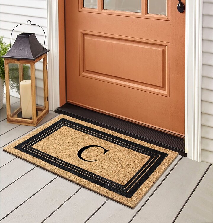 https://img.shopstyle-cdn.com/sim/87/6a/876a35b73b2df4403d87c4ed524ad810_best/a1-home-collections-a1hc-natural-coir-monogrammed-entrance-door-mats-durable-large-outdoor-rug-non-slip-flock-doormat-18-x30.jpg