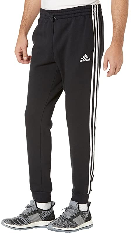 adidas Essentials 3-Stripes Tapered Cuff Fleece Pants - ShopStyle