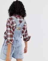 Thumbnail for your product : Cheap Monday recycled Chore denim dungaree shorts with raw hem