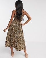 Thumbnail for your product : ASOS DESIGN DESIGN tie wrap around crinkle maxi dress in animal print