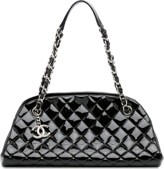 A BLACK PATENT LEATHER JUST MADEMOISELLE BAG WITH SILVER HARDWARE