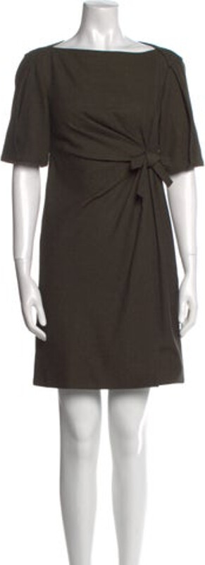 Gucci Wool Shift Dress From the 2007 Collection by Frida Giannini Brown Bow Accents Short Sleeve with Bateau Neckline Concealed Zip Closure at Back Designer