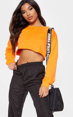 PrettyLittleThing Hot Orange Cut Off Crop Longsleeve Sweater