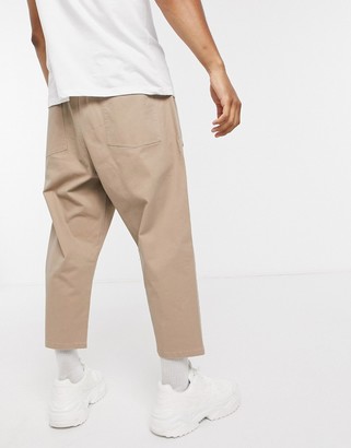 ASOS DESIGN drop crotch pants in stone - ShopStyle Chinos & Khakis