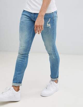 Religion Skinny Fit Jeans With Stretch And Rips In Blue