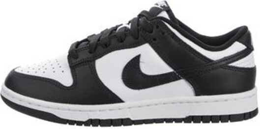 Nike Leather Low Top Sneakers Black & White Colorblock Pattern Round-Toes with Lasercut Accents Lace-Up Closure at Uppers Unfortunately, due to restrictions, this item may not be eligible for shipping in all areas.