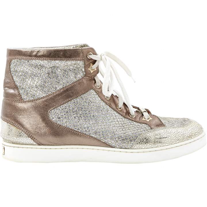 gold jimmy choo trainers