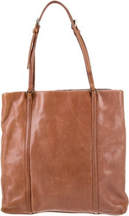 Prada Top Handle Bag Neutrals Glace Calf Leather Enameled Metal Triangle Antiqued Silver-Tone Hardware Flat Handles Satin Lining & Dual Interior Pockets Open Top Includes Dust Bag Unfortunately due to restrictions this item may not be eligible for shipping in all areas.