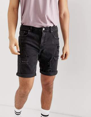 ASOS Design DESIGN denim shorts in slim washed black with heavy rips