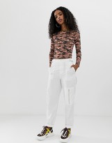 Thumbnail for your product : ASOS DESIGN long sleeve mesh top in camo print