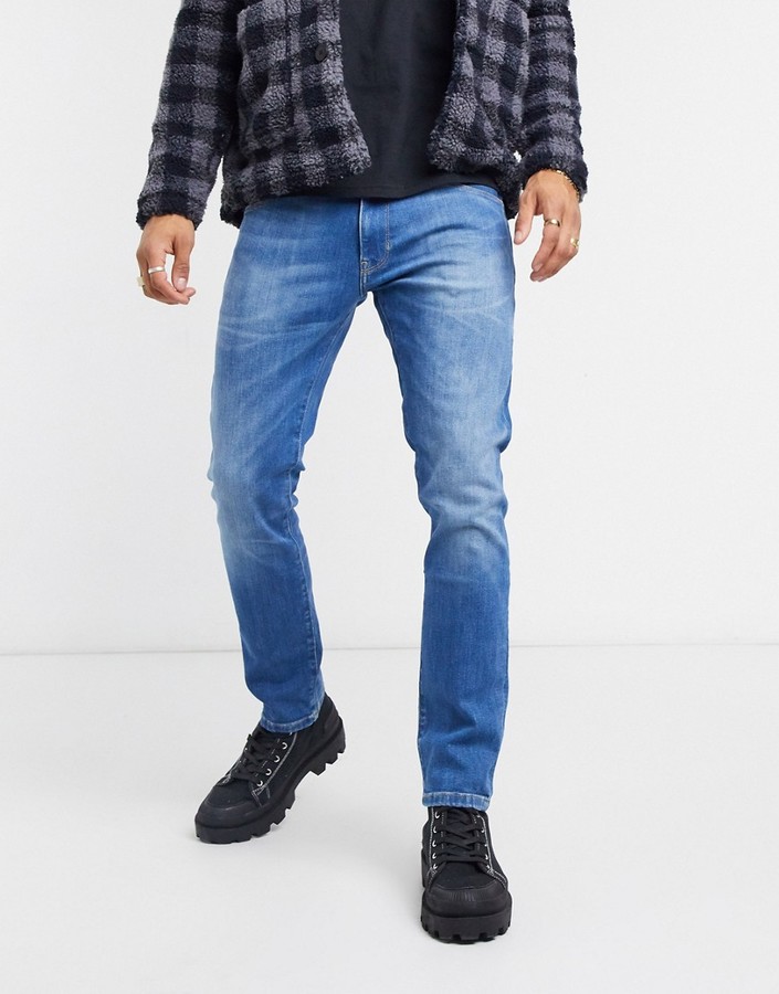Wrangler Larston slim tapered jeans - ShopStyle