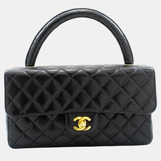 chanel pre-loved black vertical quilted lambskin kelly jumbo