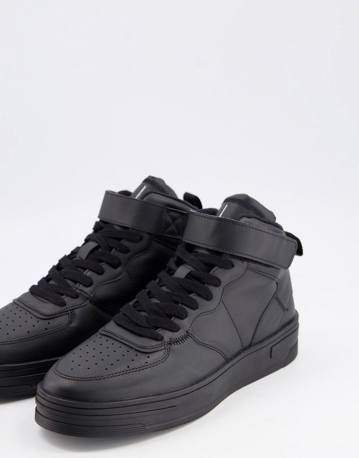 Bershka hi top sneakers with velcro strap in black - ShopStyle