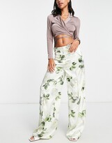 Thumbnail for your product : Liquorish satin tailored trouser co-ord with white rose print in green