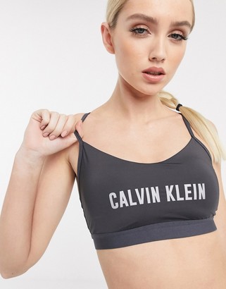 Calvin Klein Performance reflective logo sports bra in grey