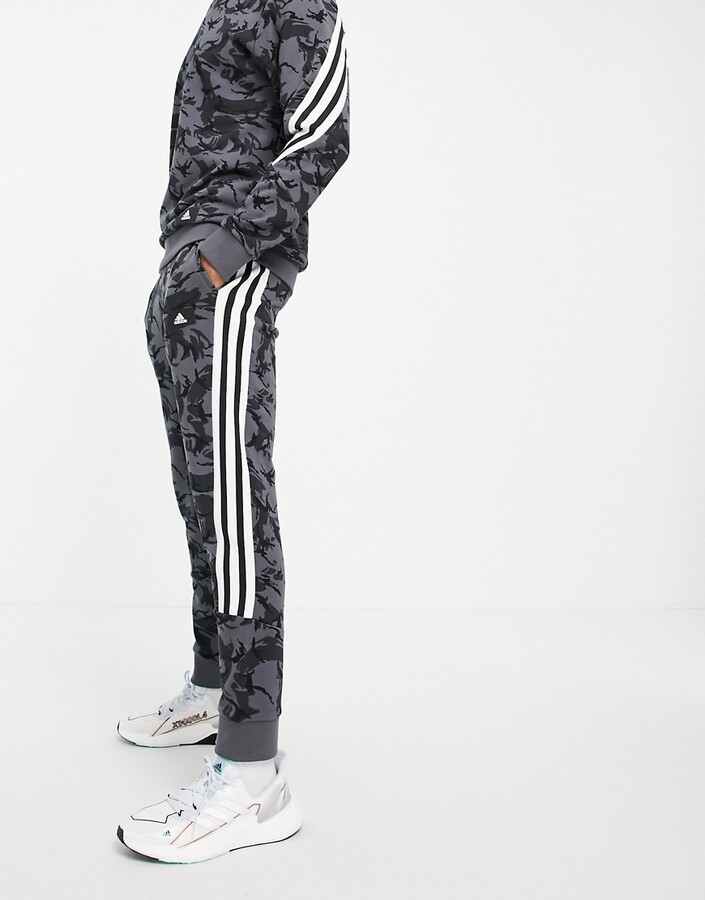 adidas joggers with three stripes in gray camo - GREY - ShopStyle Pants