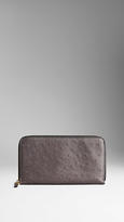 Thumbnail for your product : Burberry Ostrich Leather Ziparound Wallet