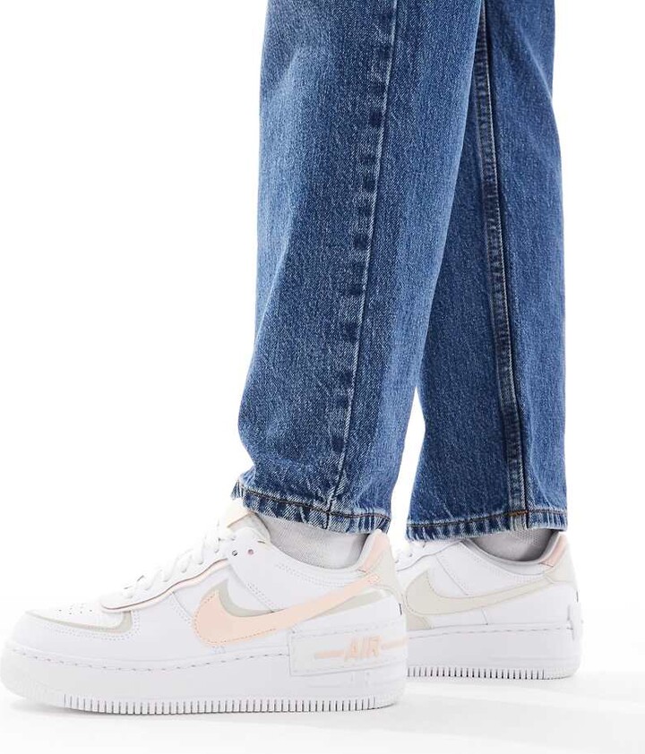 Nike Air Force 1 Shadow sneakers in white and pink