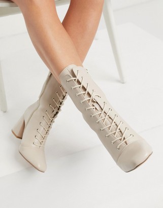 Glamorous lace-up heeled ankle boots in bone