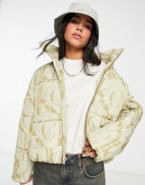 Thumbnail for your product : Calvin Klein Jeans polyester all over logo oversized puffer jacket in cream - CREAM