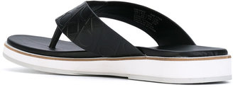 Calvin Klein logo embossed flip flops
