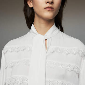 Maje Blouse with embroidered ruffles