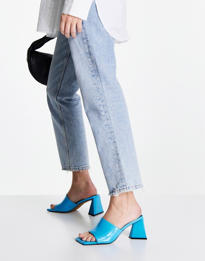 ASOS DESIGN Healing leather triangle heeled mules in blue - ShopStyle