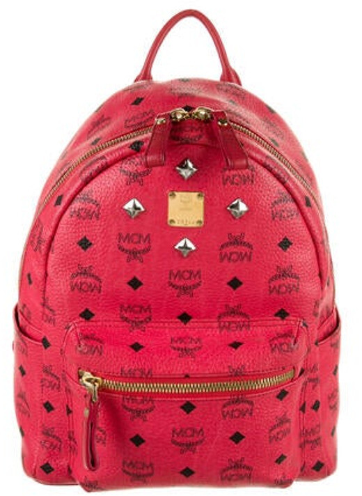 pink mcm backpack with studs