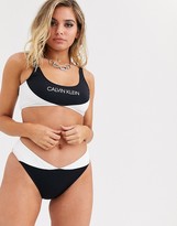 Thumbnail for your product : Calvin Klein mix and match colour block crop bikini top in black