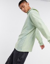 Thumbnail for your product : Collusion hoodie with print and stepped hem detail in acid wash