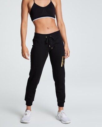 DKNY Women's Black Track Pants - Stacked Metallic Logo Joggers - Size S at The Iconic